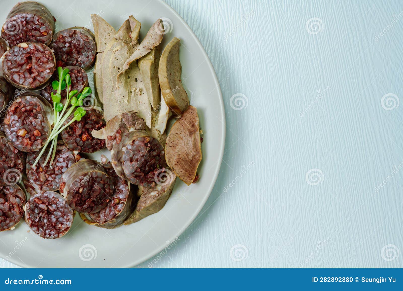 sundae, korean blood sausage : pork intestines stuffed with glass noodles, vegetables, sweet rice, coagulated pig's blood